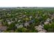 Aerial view of a neighborhood, showcasing lush greenery and residential homes in an idyllic setting at 6132 S Boston Cir, Greenwood Village, CO 80111