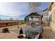 Backyard includes an outdoor kitchen and covered patio for entertaining at 11701 Elkhart St, Commerce City, CO 80603