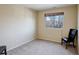 Cozy bedroom with natural light, neutral walls, and carpeted floors offers a serene living space at 11701 Elkhart St, Commerce City, CO 80603
