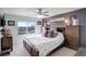 Comfortable bedroom with a large window offering scenic views and lots of natural light at 11701 Elkhart St, Commerce City, CO 80603