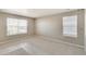 Well-lit bedroom with neutral walls and carpet at 14096 Black Sedge Cir, Parker, CO 80134