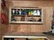 Basement workshop area featuring an organized shelving unit for tool and supply storage at 4942 Grove St, Denver, CO 80221