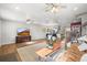 Spacious living area featuring hardwood floors and an open layout for modern living at 4942 Grove St, Denver, CO 80221