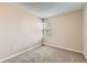 Bedroom featuring neutral carpet and a bright window at 8717 Carr Loop, Arvada, CO 80005