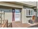 Front entrance featuring a deck with space for seating at 8717 Carr Loop, Arvada, CO 80005