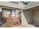 Charming home with wooden deck and covered parking area at 8717 Carr Loop, Arvada, CO 80005