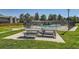 Community pool area with picnic benches and tables at 8717 Carr Loop, Arvada, CO 80005