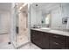 Spa-like bathroom featuring a glass shower enclosure and a modern vanity at 43 S Oneida Ct, Denver, CO 80230