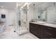 Spa-like bathroom featuring a glass shower enclosure and a modern vanity at 43 S Oneida Ct, Denver, CO 80230