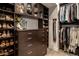 Walk-in closet with custom shelving and ample storage space at 43 S Oneida Ct, Denver, CO 80230