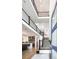 Bright open concept showing staircase, kitchen and main living area. Soaring ceilings and abundant light! at 43 S Oneida Ct, Denver, CO 80230