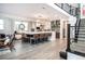 Stylish kitchen featuring a large center island with seating, stainless steel appliances, and an open layout at 43 S Oneida Ct, Denver, CO 80230