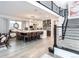 Spacious, open-concept kitchen featuring an oversized island with seating and seamless transition into the living room at 43 S Oneida Ct, Denver, CO 80230