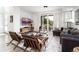 Living room with a dark gray sofa, stylish furniture and view to the outside at 43 S Oneida Ct, Denver, CO 80230