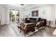 Beautiful living room with modern furniture, rug, and natural light at 43 S Oneida Ct, Denver, CO 80230