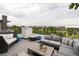 Charming rooftop deck featuring comfortable seating and scenic neighborhood views at 43 S Oneida Ct, Denver, CO 80230