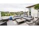 Relaxing rooftop deck with comfortable seating, offering views of the neighborhood at 43 S Oneida Ct, Denver, CO 80230