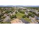 A panoramic view of a community park and surrounding neighborhood from above, showcasing the area's layout and amenities at 945 W 101St Ave, Northglenn, CO 80260