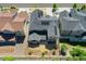 Home with solar panels, showcasing neighborhood surroundings, and fenced backyard at 10993 Ledges Rd, Parker, CO 80134