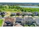 Aerial view of the home, neighborhood, and lake in the distance, showcasing its desirable location at 10993 Ledges Rd, Parker, CO 80134