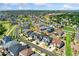 Neighborhood view of the house nestled in a beautiful community with manicured lawns at 10993 Ledges Rd, Parker, CO 80134