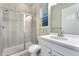 Clean bathroom with a large walk-in shower and white vanity at 10993 Ledges Rd, Parker, CO 80134