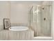 Bathroom features a large soaking tub and walk-in shower at 10993 Ledges Rd, Parker, CO 80134