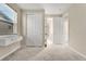Bright bedroom with built-in shelves and spacious closet at 10993 Ledges Rd, Parker, CO 80134