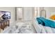 Spacious bedroom with carpeted floor, en-suite bathroom and walk-in closet at 10993 Ledges Rd, Parker, CO 80134