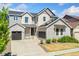 Beautiful two story home with a three car garage and stone facade at 10993 Ledges Rd, Parker, CO 80134