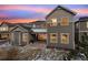 Two-story house with gray siding and deck at 10993 Ledges Rd, Parker, CO 80134