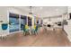 Modern kitchen with white cabinets, large island, and stainless steel appliances at 10993 Ledges Rd, Parker, CO 80134