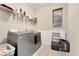 Laundry room with washer, dryer, and shelving at 10993 Ledges Rd, Parker, CO 80134