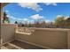 Balcony offering a peaceful view of the neighborhood and sky at 1818 S Quebec Way # 3-4, Denver, CO 80231