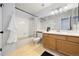 Well-maintained bathroom with a shower-tub combination, vanity, and neutral finishes at 1818 S Quebec Way # 3-4, Denver, CO 80231