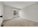 Bright and spacious bedroom with a large window offering natural light at 1818 S Quebec Way # 3-4, Denver, CO 80231