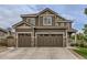 Beautiful two-story home with a three-car garage and stone accents at 12578 Hudson Ct, Thornton, CO 80241