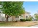 Well-kept home featuring a green lawn, front porch, white picket fence, and attractive landscaping at 20835 E 47Th Ave, Denver, CO 80249