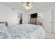 Spacious main bedroom with an attached bathroom and walk-in closet for comfortable living and storage at 20835 E 47Th Ave, Denver, CO 80249