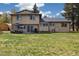 Spacious backyard with patio area and ample lawn space, great for outdoor activities at 1866 Mountain View St, Erie, CO 80516