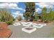 Neatly arranged garden beds with rock and mulch landscaping in front of a charming home at 1866 Mountain View St, Erie, CO 80516
