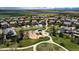 Gathering-friendly neighborhood featuring a playground, green spaces, and charming homes in a serene suburban setting at 420 Graham Cir, Erie, CO 80516