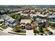 Residential neighborhood with well-maintained homes, landscaped yards, and tree-lined streets in a suburban setting at 420 Graham Cir, Erie, CO 80516
