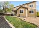 A well-maintained backyard featuring a lush lawn and a patio area, ideal for entertaining or relaxing outdoors at 420 Graham Cir, Erie, CO 80516