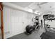 Basement gym with exercise equipment, mirror, and ceiling fan at 420 Graham Cir, Erie, CO 80516