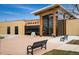 Modern library exterior with a prominent entrance, ample windows, and a welcoming public space with benches at 420 Graham Cir, Erie, CO 80516