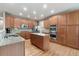 Modern kitchen with granite countertops, stainless steel appliances, and ample cabinet space at 420 Graham Cir, Erie, CO 80516