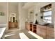 Bright bathroom features dual sinks, vanity, and elegant mirrors creating a luxurious and functional space at 10177 Rancho Montecito Dr, Parker, CO 80138