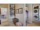 Well-organized walk-in closet with shoe storage, laundry facilities, and ample space for clothing and accessories at 10177 Rancho Montecito Dr, Parker, CO 80138