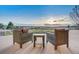 Relaxing patio with comfortable seating and breathtaking views perfect for outdoor living at 10177 Rancho Montecito Dr, Parker, CO 80138